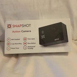 Snap shot action camera. Never opened.
